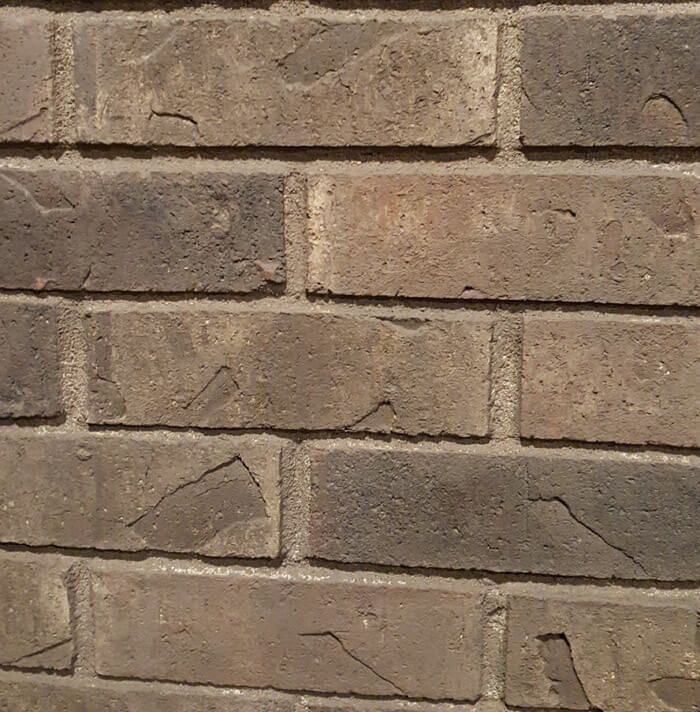 grey washed brick fireplace